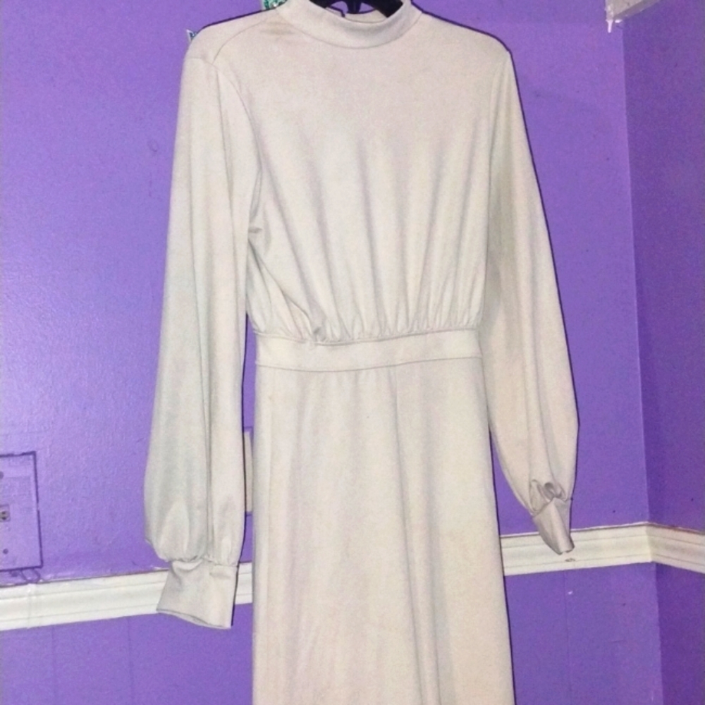 An offWhite  backless Pantsuit